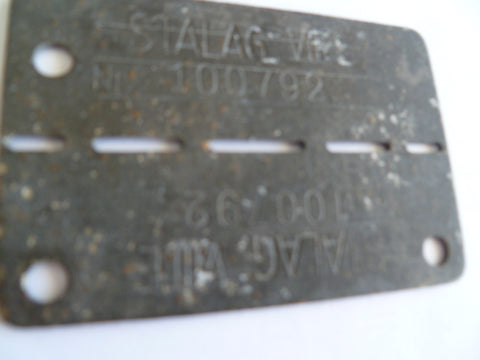german POW id tag stalag v111e number 100792
