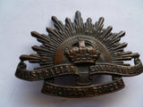aust rising sun cap badge ww2 stoke and son brass dark