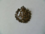 home front and army ATS lapel badge with number on back