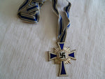 GERMAN MOTHERS CROSS IN 'SILVER'