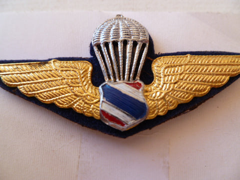 THAILAND a/b wings METAL coloured police?