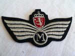 DENMARK airforce cloth  wing has  M on