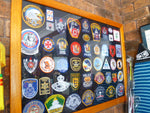 frame of police patches from aust and world nice lot 45