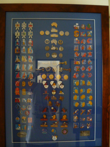 framed lot of all the olympic badges done by the major firm