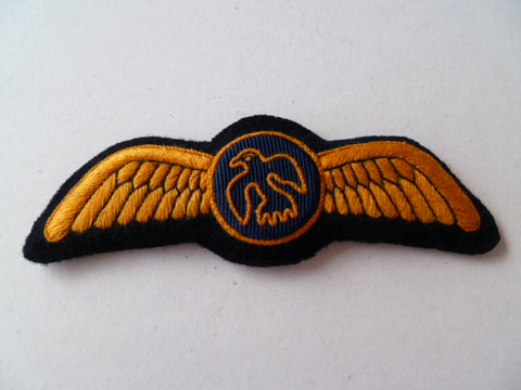 AIRLINE WING  Gold bird on blue circle