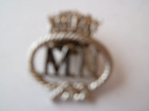 BRITAIN  MERCHANT MARINE  lapel badge newer voided