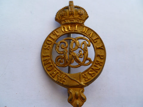 brit/indian turban type badge has long pin on back as made