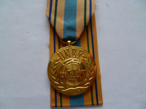UNEF medal gold plated really nice looking medal