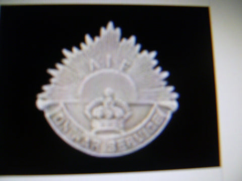 ww1 on war service w/rising sun lapel badge silver  hallmarked