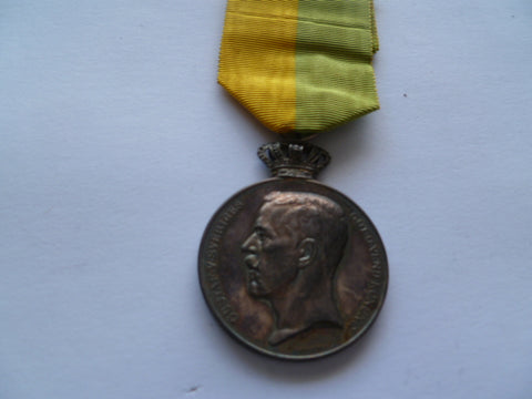 SWEDEN faithful service medal nsmed to a brit \?